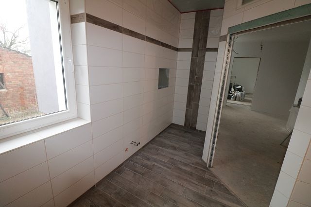 3-Raumwohnung im Erdgeschoss mit Hof/Gartenbereich -Erstbezug -