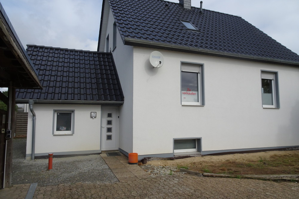 Kleines modernes Einfamilienhaus in ruhiger Zentrumslage von Enger mit einem Bauplatz
