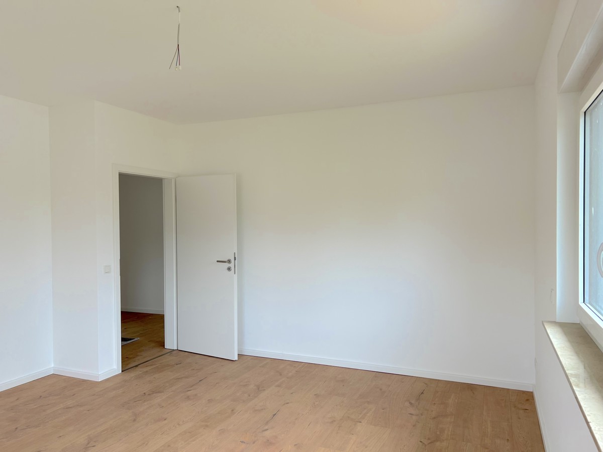 PROVISIONSFREI |Erstbezug von 200 m² Villa mit Balkon, Dachterrassen-Garage und 1.129 qm Garten