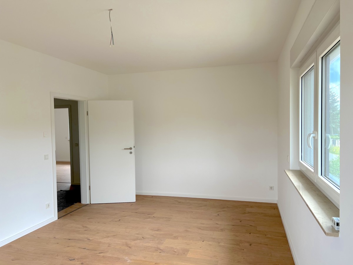 PROVISIONSFREI |Erstbezug von 200 m² Villa mit Balkon, Dachterrassen-Garage und 1.129 qm Garten