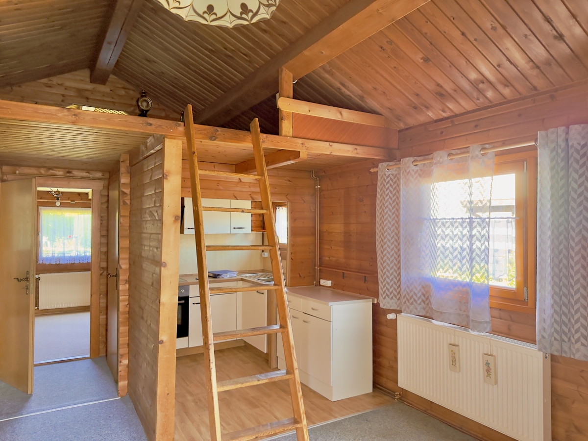 PROVISIONSFREI | Wohnen auf einer Ebene – Charmantes Blockbohlenhaus mit großem Grundstück