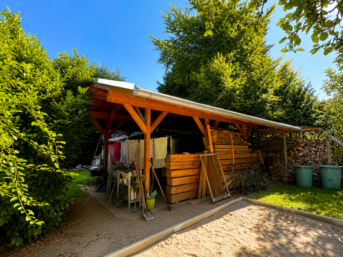 Modernisiertes Einfamilienhaus mit viel Nutzfläche, Garten und Autowerkstattpotenzial