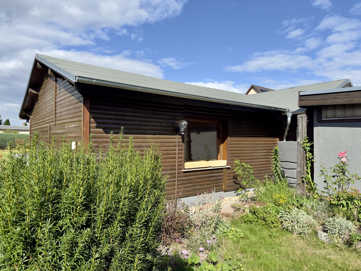 RESERVIERT | Provisionsfreies Blockbohlenhaus mit Garage auf über 1.000qm im Blumenhag